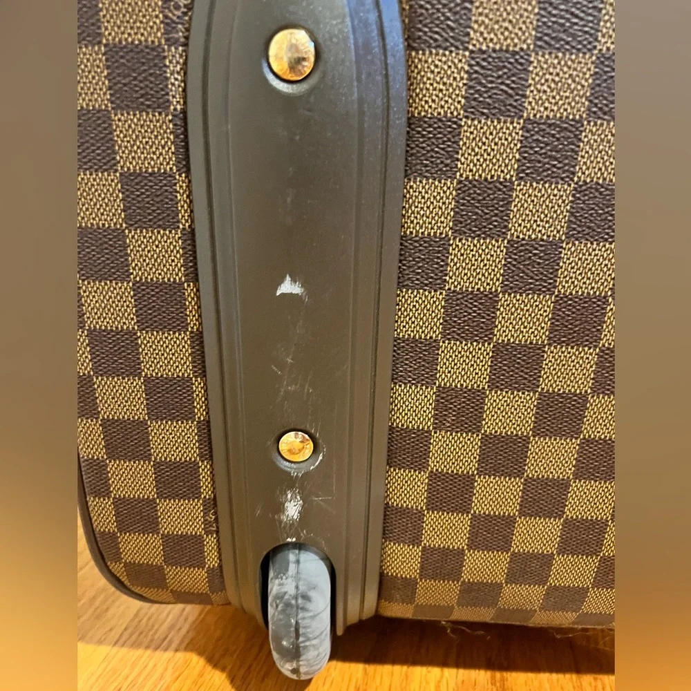 Louis Vuitton suitcase about 26x18x10 inches